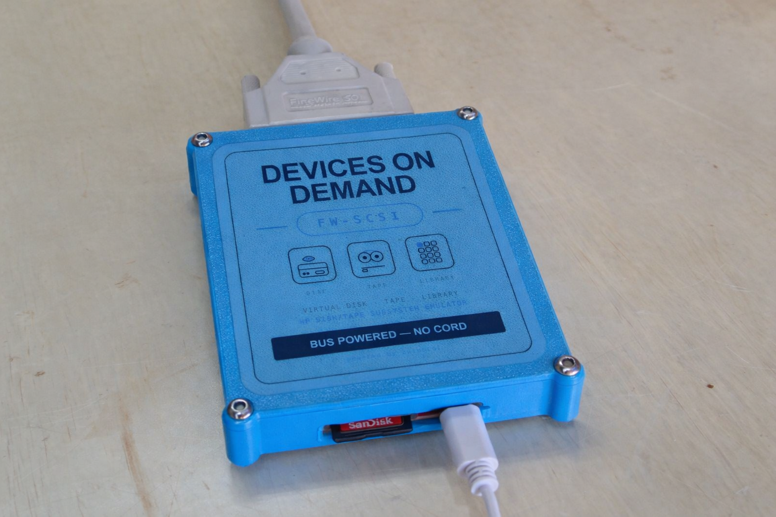 Devices on Demand: a bus-powered box that plugs into the SCSI port and emulates an HP 3000 virtual disk, tape, and library subsystem from an SD card.